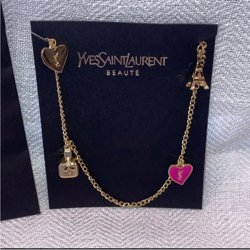 Yves saint Lauren purse or phone accessories (authentic brand new)